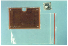 The JEMBEC plate is used primarily when genital specimens for culture must be transported long distances to the microbiology laboratory. After the white CO2-generating tablet (top right) is placed in the well in the rectangular culture plate, the plate is sealed in the plastic zip-lock bag. CO2 accumulates, providing the appropriate atmosphere for growth of Neisseria gonorrhoeae.