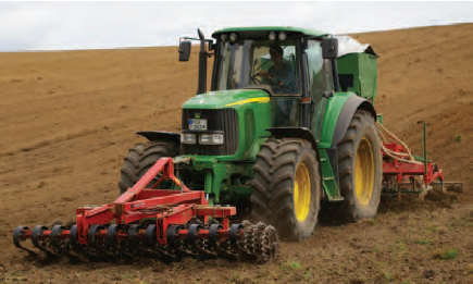 Figure 17.15 Seedbed preparation . Several stages of the process are completed in a single pass